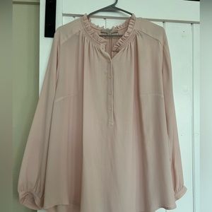 Woman’s plus size pink blouse